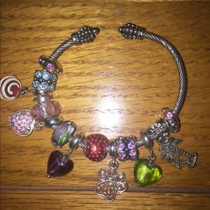 Silver bracelet with charms